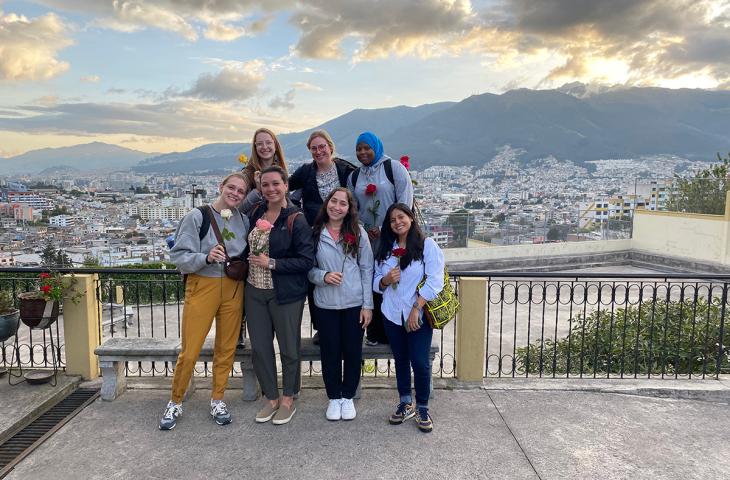 A group of students who traveled to Ecuador for a CGHSR course pose for a picture.