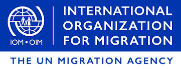 International Organizational for Migration (The UN Migration Agency) text on blue logo
