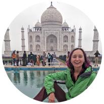 Christina Daragan sitting in front of the Taj Mahal