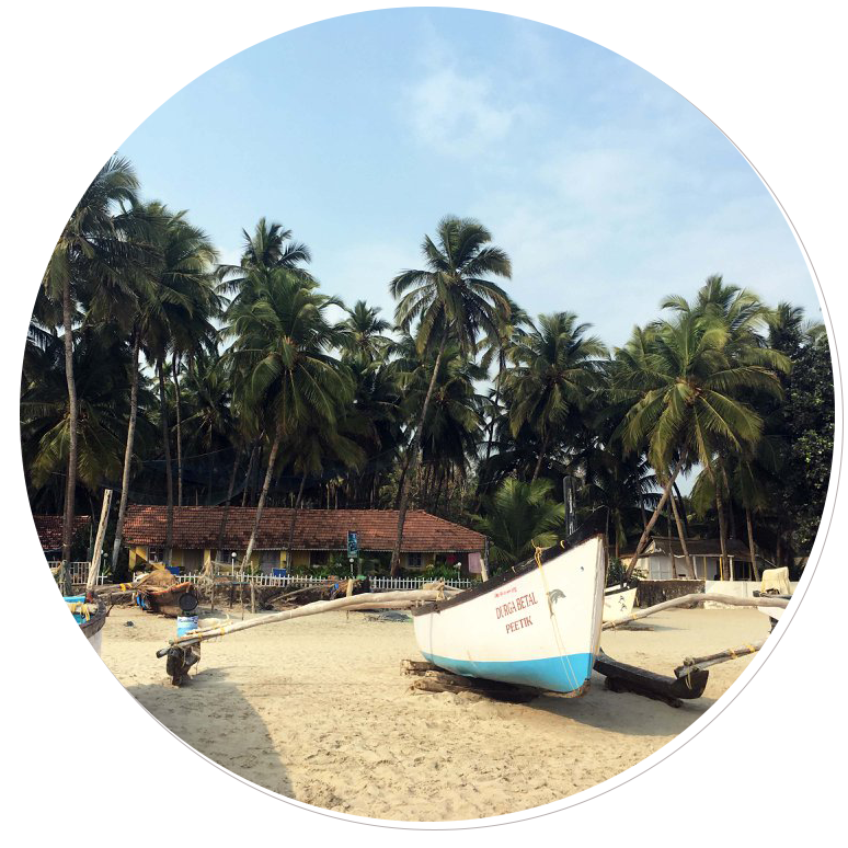 a beach with a beached ferry close to one of the Grant recipient's project sites at a waste management plant in Goa, India