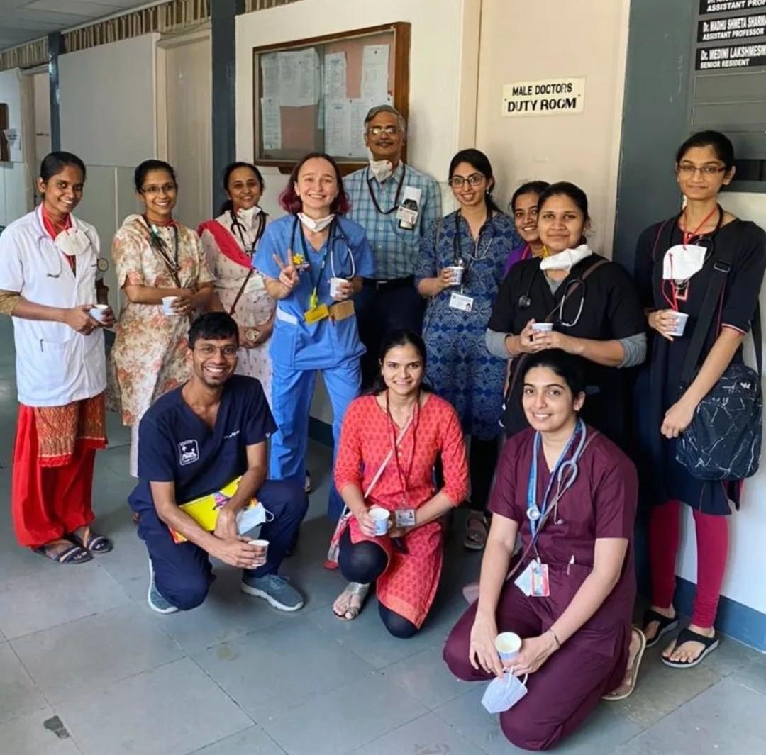 Christina Daragan stands with other members of the Pediatrics Unit at the St John's Hospital in Bangalore, India, on one of their daily tea breaks in the afternoon
